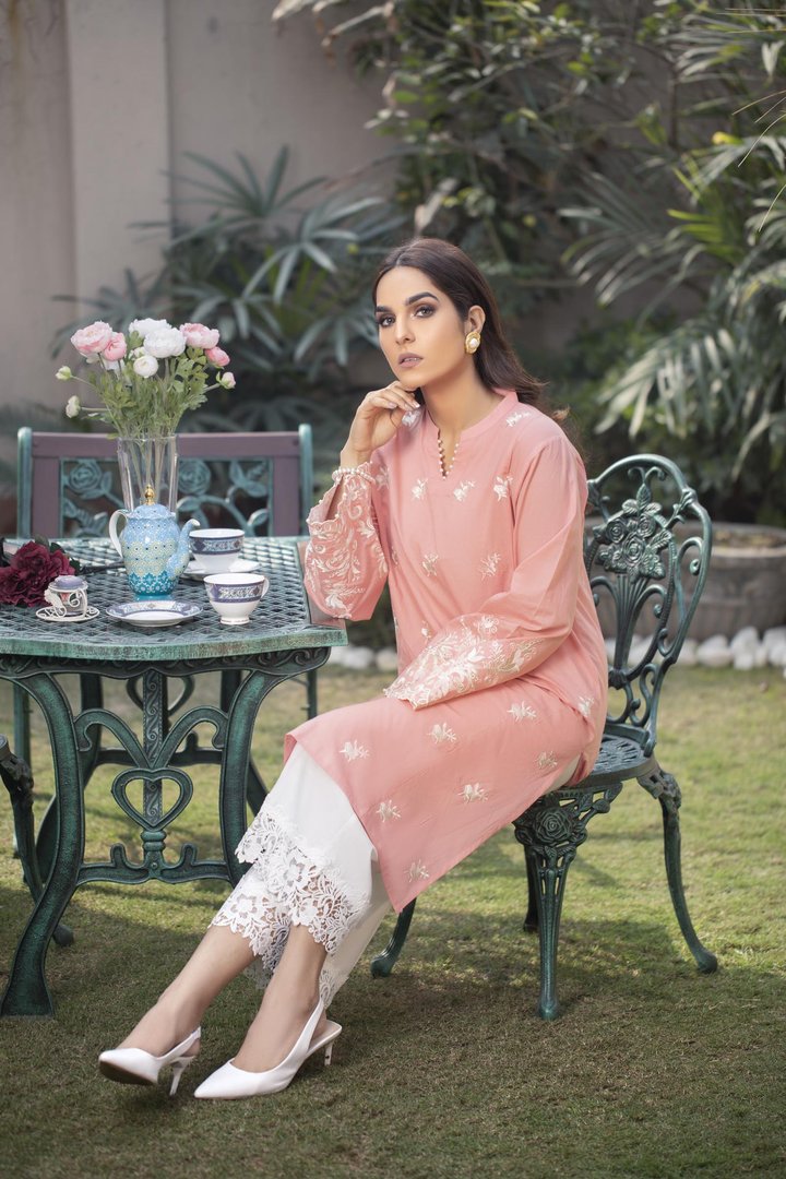 Pastel Peach Kurti With White Embroidery Front & Sleeves.